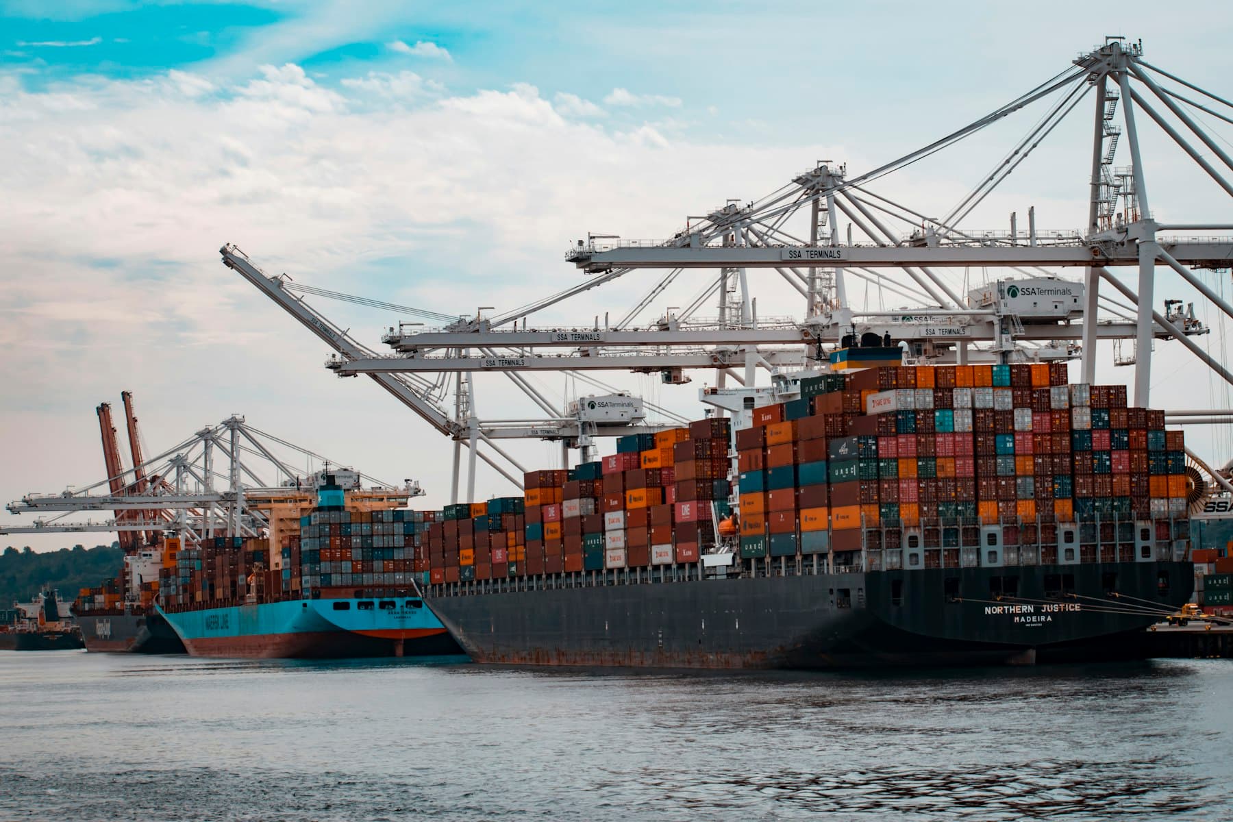 Container ships and cranes at a commercial port